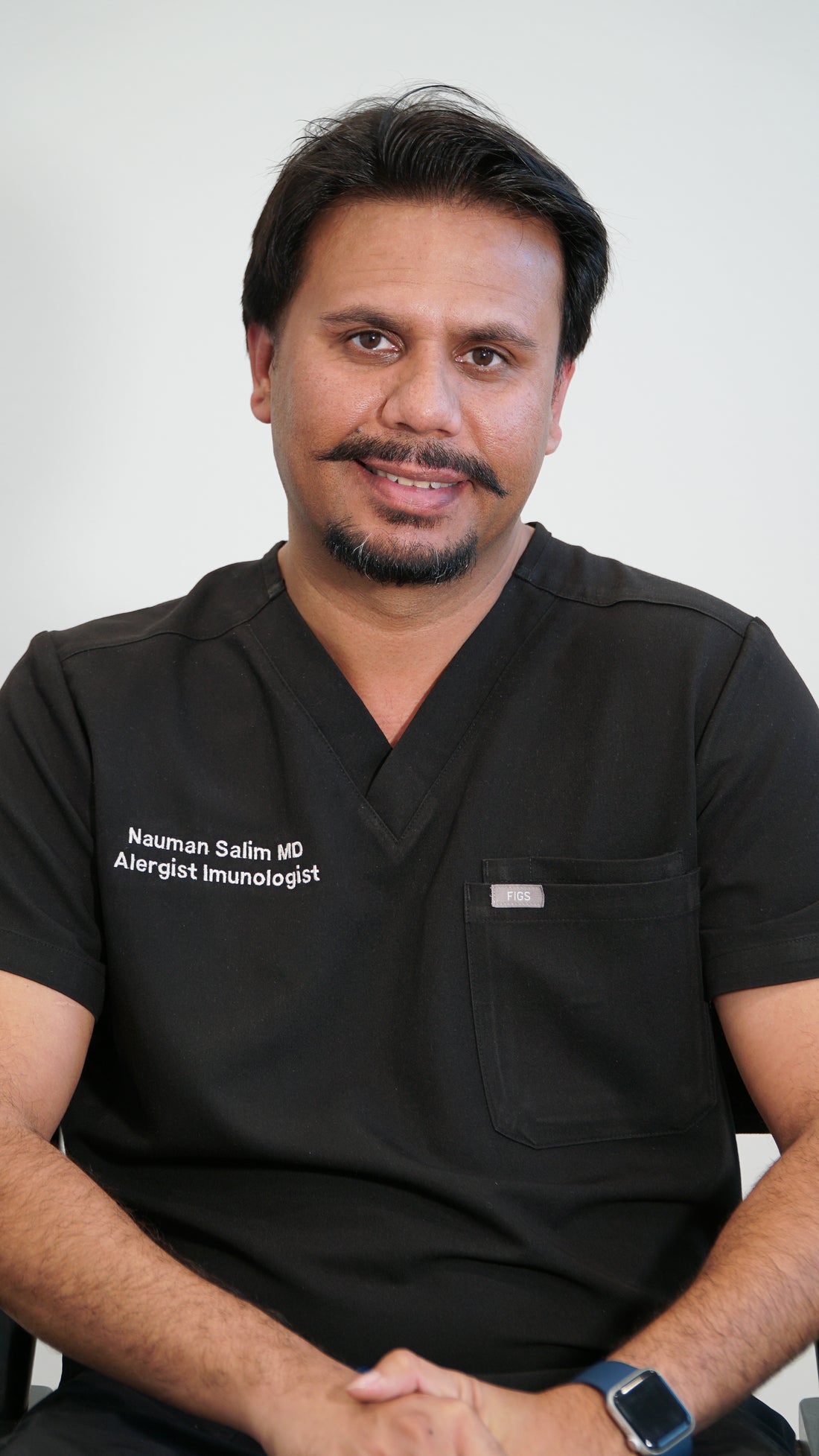 Physician reviewing patient eligibility